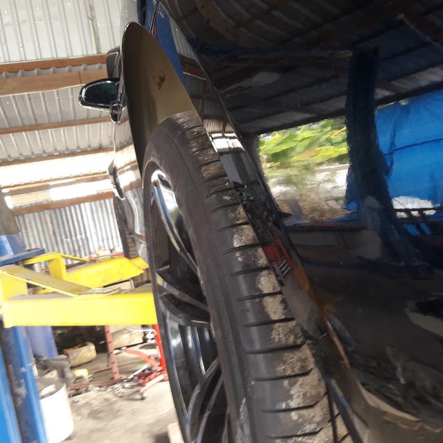 Car on the lift for wheel work
